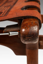 Load image into Gallery viewer, Mid-Century Modern Tooled Embossed Leather Sling Ottoman / Footstool in Original Condition by Angel Pazmino, Ecuador, c. 1960s-ABT Modern