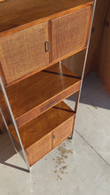 Load and play video in Gallery viewer, Mid-Century Modern Wall Unit / Bookcase / Display Cabinet in Walnut & Stainless Steel by Jack Cartwright for Founders, USA, c. 1960s