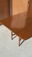Load and play video in Gallery viewer, Mid-Century Modern Drop-Leaf Dining Table in Walnut by Kipp Stewart for the Declaration Line for Drexel, USA, c. 1960's