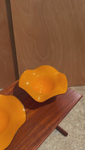 Load and play video in Gallery viewer, Set of Two (2) Teleflora Blown Art Glass Serving Bowls in Vibrant Orange & Clear Pedestal Bases, USA, c. 1970s