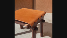 Load and play video in Gallery viewer, Mid-Century Modern Tooled Leather Sling Ottoman / Footstool by Angel Pazmino, Ecuador, c. 1960s