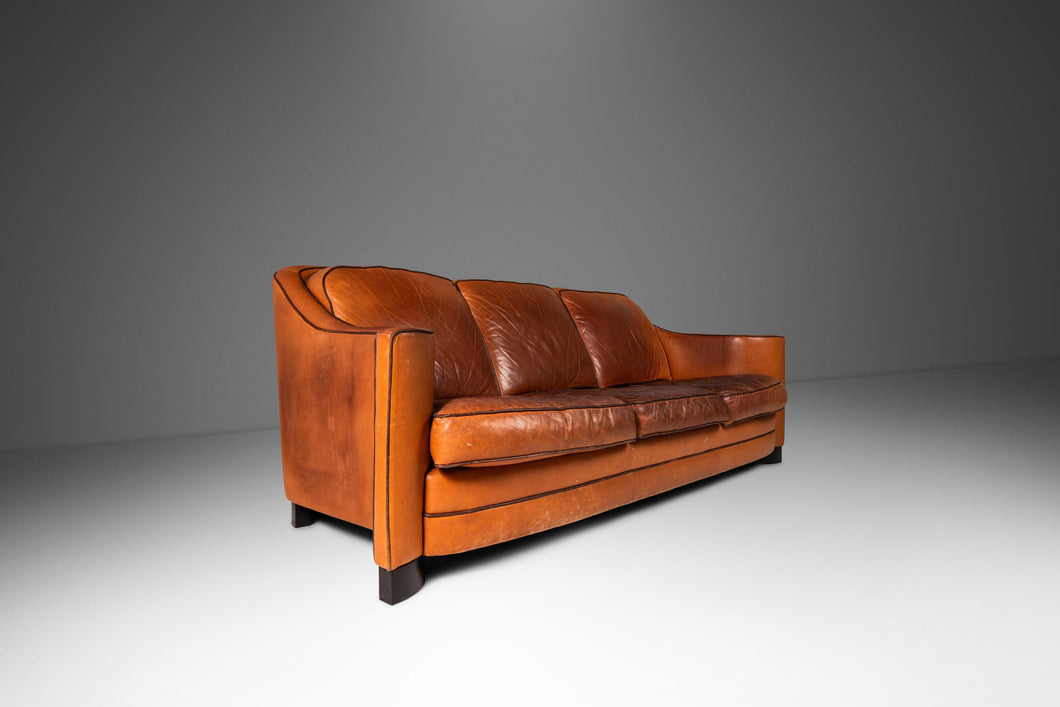 Art Deco Mid-Century Modern Three-Seater Sofa with Sculptural Arms in Patinaed Leather, USA, c. 1970s-ABT Modern