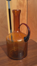 Load and play video in Gallery viewer, Mid-Century Modern Abstract Studio Craft Amber Blown Glass Pitcher / Bottle / Bud Vase / Vessel, USA, c. 1970s
