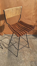 Load and play video in Gallery viewer, Set of Three ( 3 ) MCM Wrought Iron Bar Stools in Maple &amp; Raffia Rope for by Arthur Umanoff for Raymor, USA, c. 1960s

