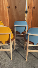 Load and play video in Gallery viewer, Rare Set of Eight (8) Mid-Century Modern Multi-Colored Dining Chairs by Elliots of Newbury After Arne Vodder, England, c. 1960's
