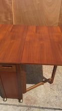 Load and play video in Gallery viewer, Restored Mid-Century Modern Space Saver Minimalist Hide Away Dropleaf Table w/ 4 Hidden Folding Chairs, Romania, c. 1960's
