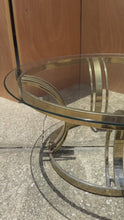 Load and play video in Gallery viewer, Mid-Century Modern Hollywood Regency Patinaed Coffee Table in Brass w/ Glass Top in the Manner of Milo Baughman, USA, c. 1980s
