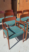 Load and play video in Gallery viewer, Set of Eight (8) Moller Model 75 Dining Chairs by Niels Møller for J.L. Møllers in Pierre Frey Mombasa Turquoise Fabric , Denmark, 1960s
