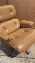 Load and play video in Gallery viewer, Authentic Eames Lounge Chair Model 670 and Ottoman Model 671 in Original Cognac Leather &amp; White Oak by Herman Miller, USA, c. 2007

