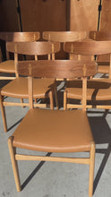 Load and play video in Gallery viewer, Set of Six ( 6 ) Early Hans Wegner CH23 Dining Chairs for Carl Hansen and Søn in Oak &amp; Teak w/ New Leather Seats, Denmark, c. 1950s
