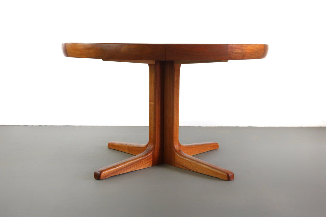 Scandinavian Teak Extendable Dining Table with Central Leg by Ib Kofod Larsen for Faarup Møbelfabrik, 1960s-ABT Modern