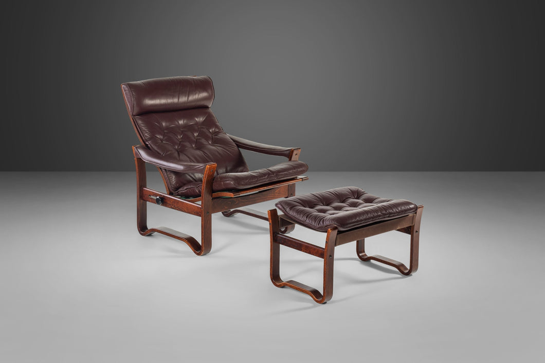 Tufted Oxblood Leather Lounge Chair and Ottoman in Afromosia Wood After Westnofa, c. 1970s-ABT Modern
